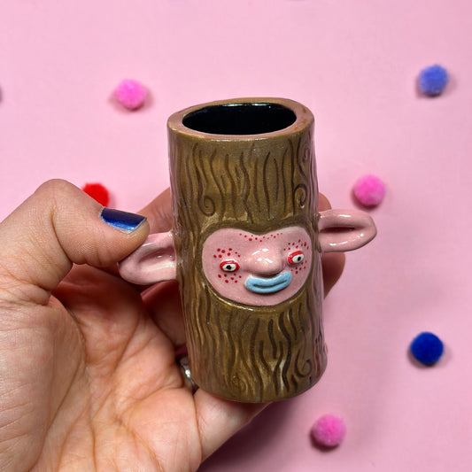 Miniature candle holder in the shape of a forest creature