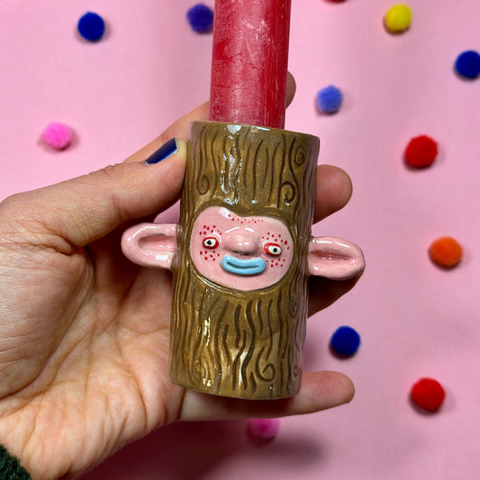 Miniature candle holder in the shape of a forest creature